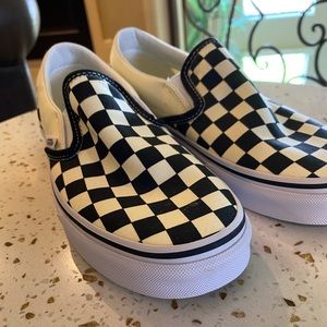 Vans checkerboard slip on shoes.